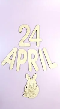 Orthodox Easter date - April 24, decorative wooden elements. Vertical. Stock Photos