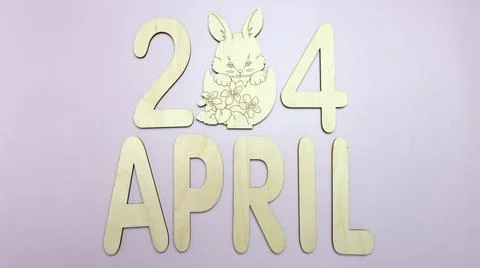 Orthodox Easter date - April 24, decorative wooden elements. Stock Photos