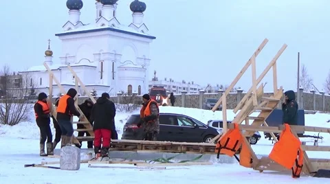 Orthodox holiday of Epiphany. Making Ice-Hole For Winter Swimming Stock-Footage 59587438