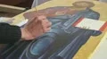 Orthodox icon. Iconography. The icon painter at work in the icon workshop. HD Footage