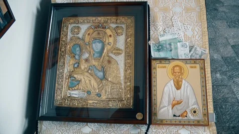 Orthodox Icons on a Prayer Table Vídeo Stock 95577906