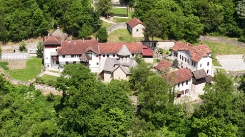 Orthodox Monastery in Forest of Ovcar Banja, Serbia, Drone Aerial View on Sunny 動画素材 346421802