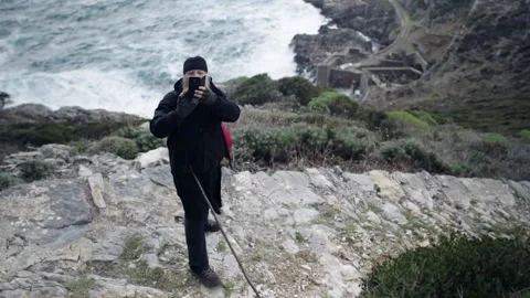 Orthodox monk taking a selfie on Mount Athos Stock Footage 330196940