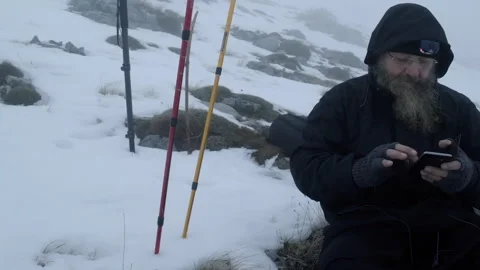 Orthodox monk using a smartphone on Mount Athos Stock Footage 330215579