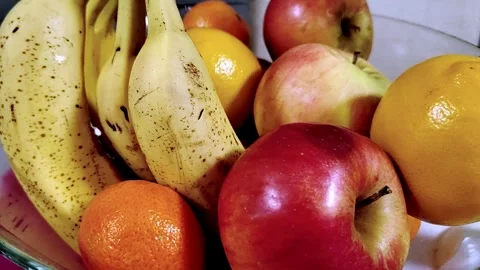 Orthodox Slavic table, bananas, apples and tangerines in a bowl Stock Footage 269830102