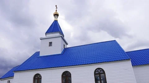 Orthodox small church on the background of cloudy sky, timelapse Stock Footage 194737872