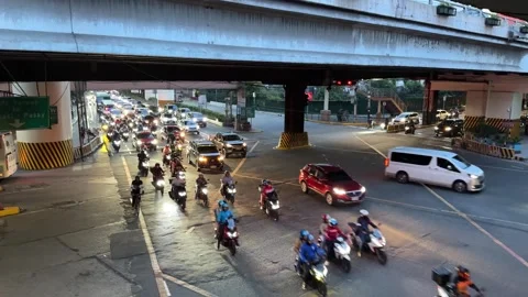 Ortigas Intersection Night Traffic Motorcycles Gridlock High Angle 4K 60fps Wide Stock Footage 338186723