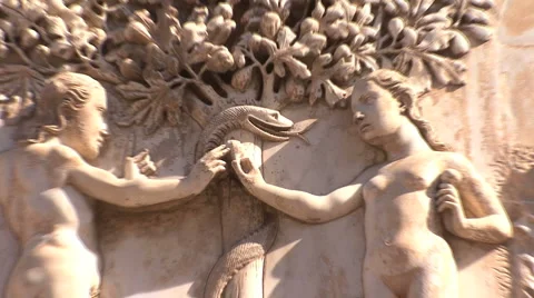 Orvieto carving Adam and Eve zooms Stock Footage
