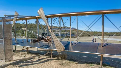 Orville Wright Sculpture on Flyer Model at their National Memorial Stock Footage 73026816