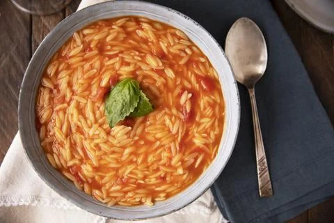 Orzo Soup with Basil Flat Lay Stock Photos