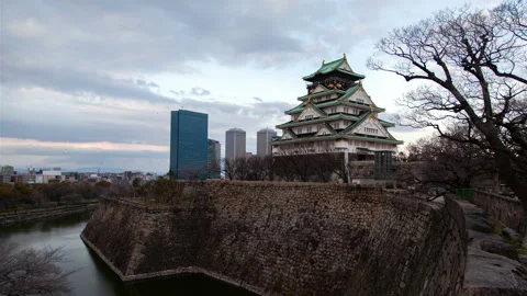 Osaka castle with defence wall at sunset timelapse Stock Footage 116664701
