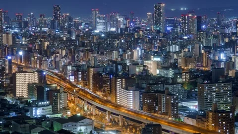 Osaka City Night View Timelapse, High Angle Overview and Road Traffic, Japan Stock Footage 334557592