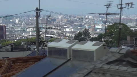 Osaka Cityscape Seen From Moving Train Window Stock Footage 264344414