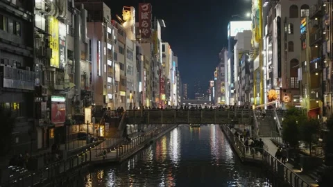 Osaka Dotonbori Canal in the Evening, Evening Lights Illuminating City Stock Footage 222674635