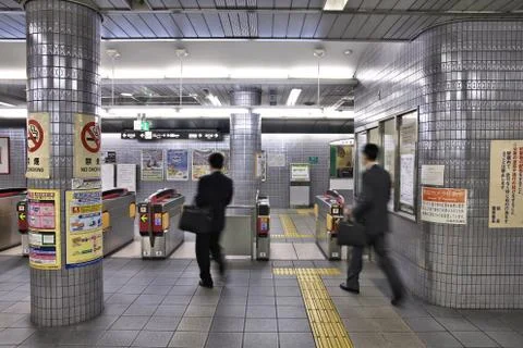 OSAKA, JAPAN - APRIL 25, 2012: People hurry at Osaka Subway station in Osaka, Stock Photos