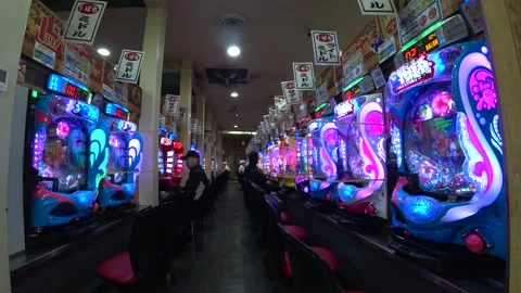 OSAKA, JAPAN : View inside Pachinko parlor. Mixture of slot machine and pinball. Stockbeeldmateriaal 283687675