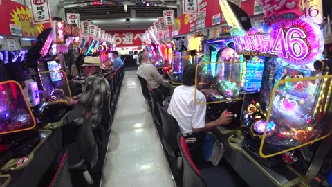 OSAKA, JAPAN : View inside Pachinko parlor. Mixture of slot machine and pinball. Vídeo Stock 283687731