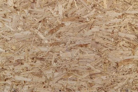 OSB board (Oriented Strand Board), showing overlapping wood fiber texture Stock Photos