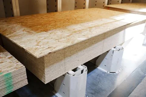 OSB board on a rack in a hardware store. Oriented Strand Board Stock Photos