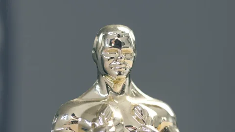 Oscar Statue Closeup Rotating Around Stock Footage 102803381
