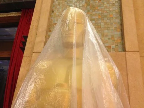 Oscars Statue Wrapped in Plastic Before the Academy Awards Stock Photos