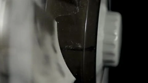 Oscillating Fan Blades in Close-Up Against Dark Background Vidéo 344964474