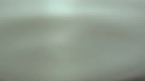 Oscillations and splashes from heavy raindrops at sunlight Stock Footage 236928651