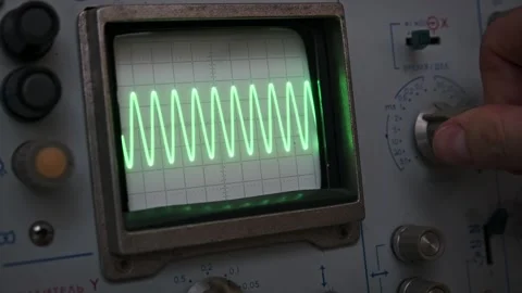 Oscilloscope Frequency Adjustment: Sine Wave Stock Footage 303890448