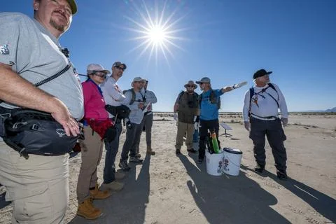 OSIRIS-REx Sample Return Training. Recovery teams participate in field rehe.. Stock Photos