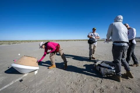 OSIRIS-REx Sample Return Training. Recovery teams participate in field rehe.. Stock Photos