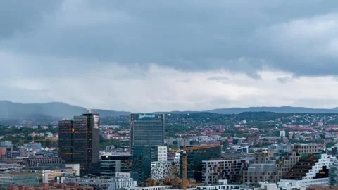 Oslo Evening Clouds Dramatic Downpour Timelapse with Urban Lights Stock Footage 309565360