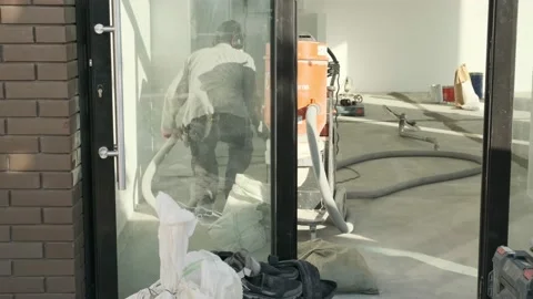Oslo, Norway, July 2022: The builder performs finishing work in the room Stock Footage 206004075