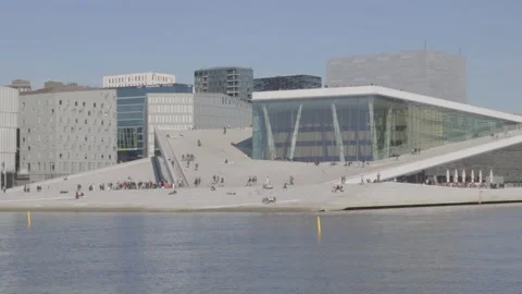 Oslo Opera House Building with Marble Roof and Visitors Viewed from Water Stock Footage 340960214