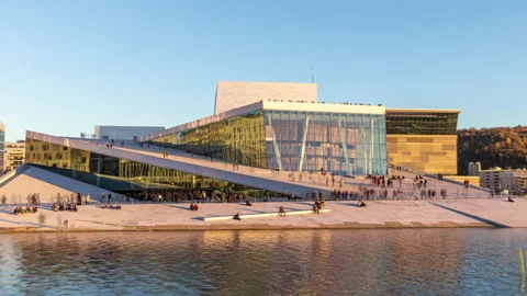 Oslo opera house hyper-lapse with people walking in the afternoon light, on a Stock Footage 232298854