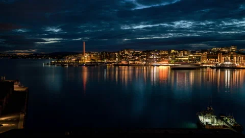 Oslo waterfront evening cityscape timelapse with marina yachts Stock Footage 230113472