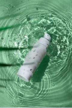 Osmetic cream spray bottle packaging product on water pool with summer season Stock Illustration