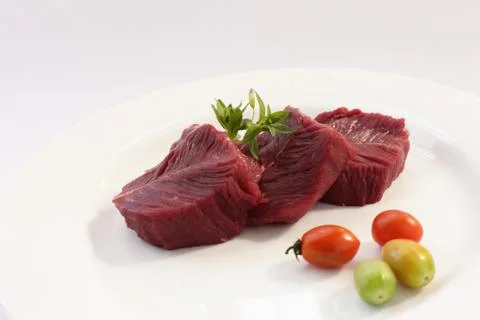Osstrich meat on the white background Stock Photos