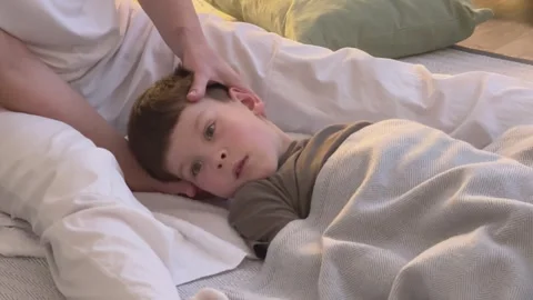 Osteopath Adjusting Child Head And Ear Area Gentle Pediatric Therapy Neck And 库存影片 336470567