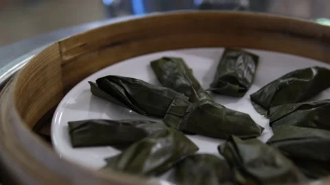 Otak-otak Southeast Asian fish cake and wrapped in leaf parcels. Stock Footage 311128053