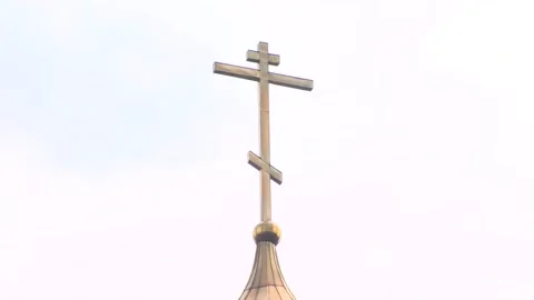 Othodox cross on white sky background. Neutral background. Stock-Footage 94043811