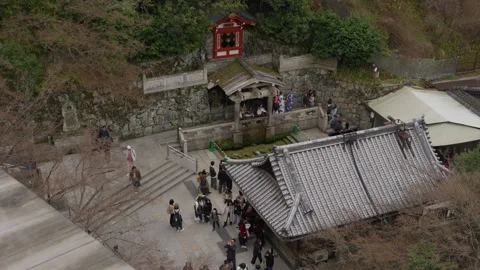 Otowa Waterfall and Visitors Queuing at Kiyomizu dera Kyoto Japan Stock Footage 343988394