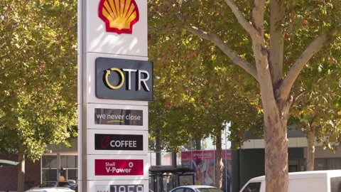 OTR And Shell V-Power Fuel Price Sign With Viva Energy Branding On Adelaide Stock Footage 336062994