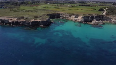 Otranto - Overflight of a stretch of coast of the Bay of the Water Mill in the p 動画素材 194033767