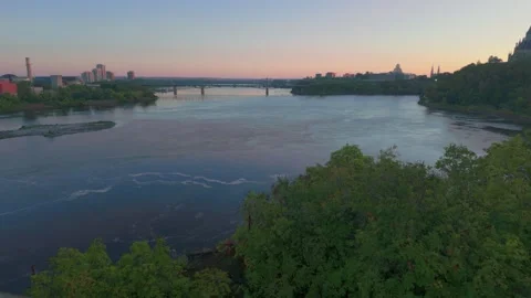 Ottawa River Panoramic Skyline and Alexandra Bridge at Sunrise Canada Stock Footage 345853779