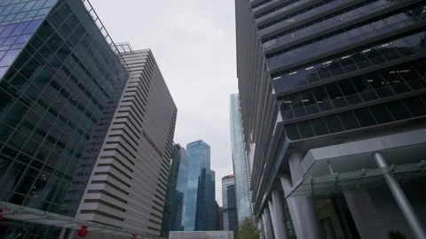 OUE Tower architecture surrounded by modern skyscrapers creating an iconic Stock-Footage 343559610