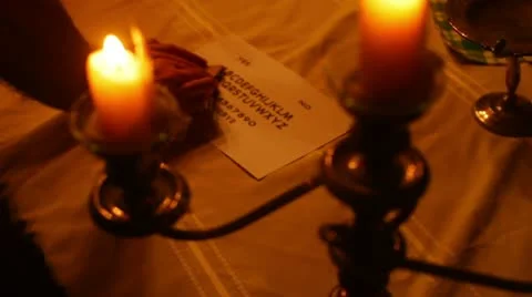 Ouija board candle light Stock Footage 11624352