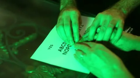 Ouija board seance spiritual ritual Stock Footage
