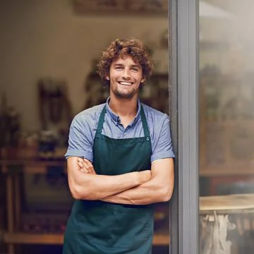 Our coffee sets us apart from our competitors. Portrait of a successful young Stock Photos