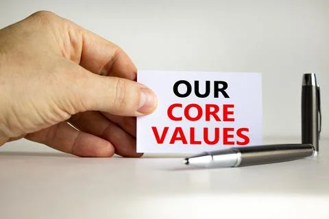 Our core values symbol. White paper with words 'Our core values' in businessm Stock Photos