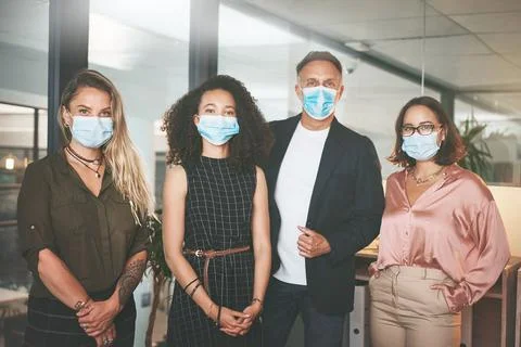 Our dress code may have changed but our goals havent. a diverse group of Stockfoto's